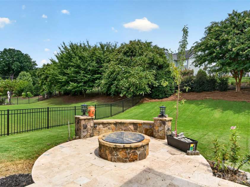 113 Heron Cove Loop, Mooresville, NC 28117.  MLS# CAR4405007, YatesRealty ID 43305. Built in firepit