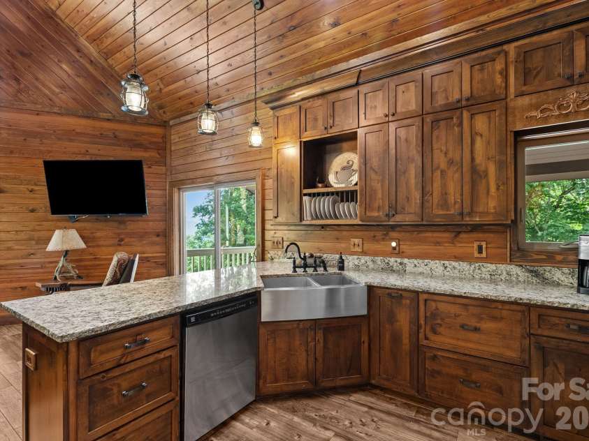 100 Moonshineholler Drive, Maggie Valley, NC 28751.  MLS# CAR4412066, YatesRealty ID 43311. 