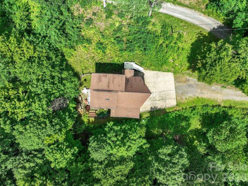100 Moonshineholler Drive, Maggie Valley, NC 28751.  MLS# CAR4412066, YatesRealty ID 43311. 