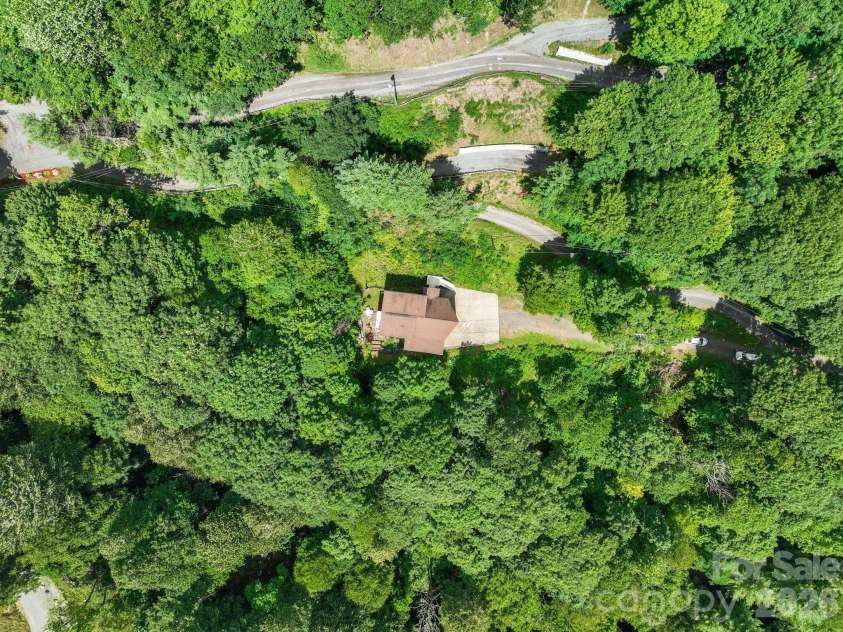 100 Moonshineholler Drive, Maggie Valley, NC 28751.  MLS# CAR4412066, YatesRealty ID 43311. 