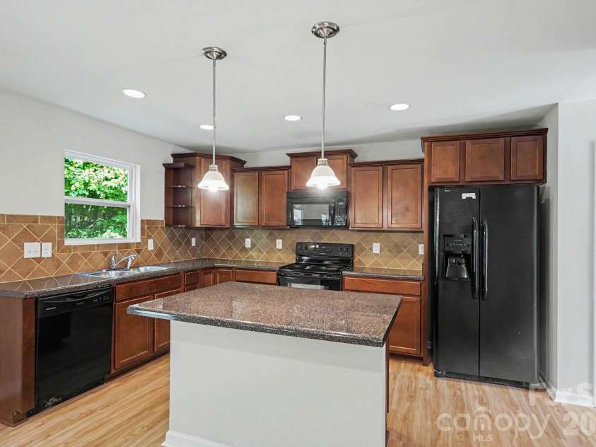 7227 Cypress Ridge Drive, Charlotte, NC 28262.  MLS# CAR4406477, YatesRealty ID 43313. 