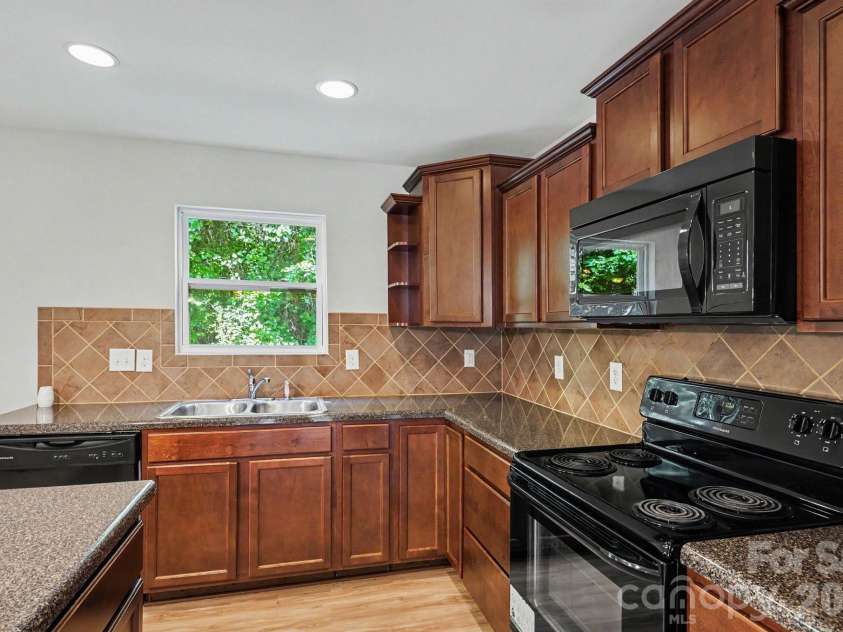 7227 Cypress Ridge Drive, Charlotte, NC 28262.  MLS# CAR4406477, YatesRealty ID 43313. 