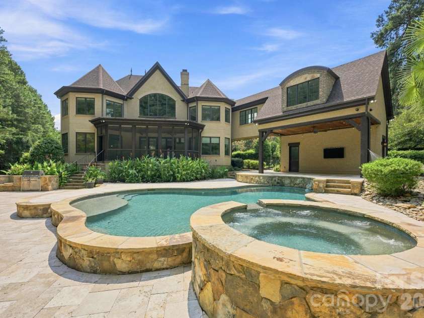 111 Quaker Road, Mooresville, NC 28117.  MLS# CAR4407385, YatesRealty ID 43314. Back Yard is a Private Oasis