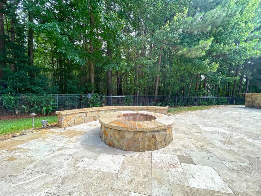 111 Quaker Road, Mooresville, NC 28117.  MLS# CAR4407385, YatesRealty ID 43314. Fire Pit with Built-In Seating