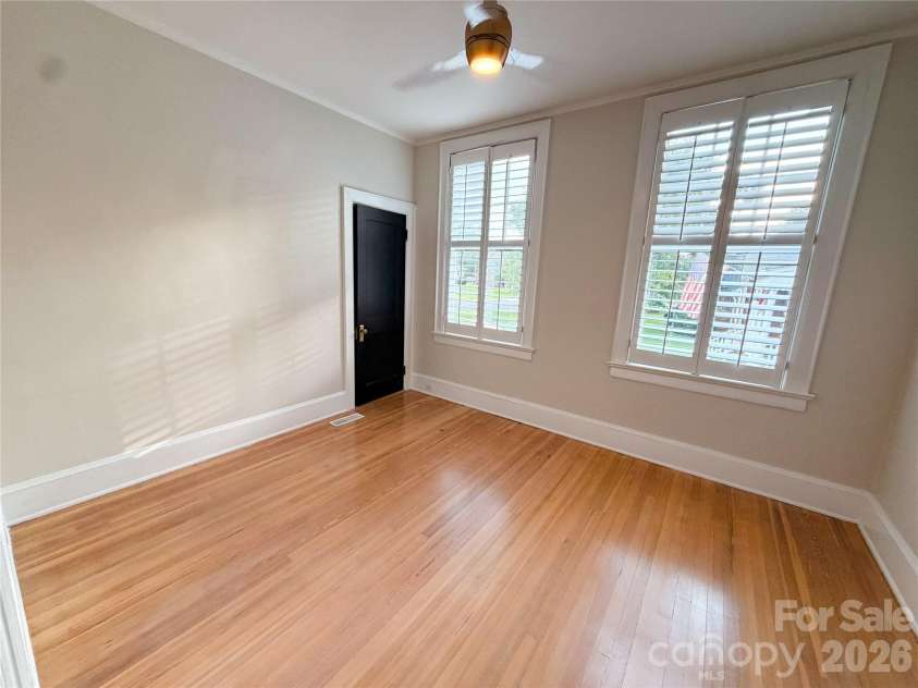 925 Main Street, Albemarle, NC 28001.  MLS# CAR4411187, YatesRealty ID 43315. Main floor bedroom