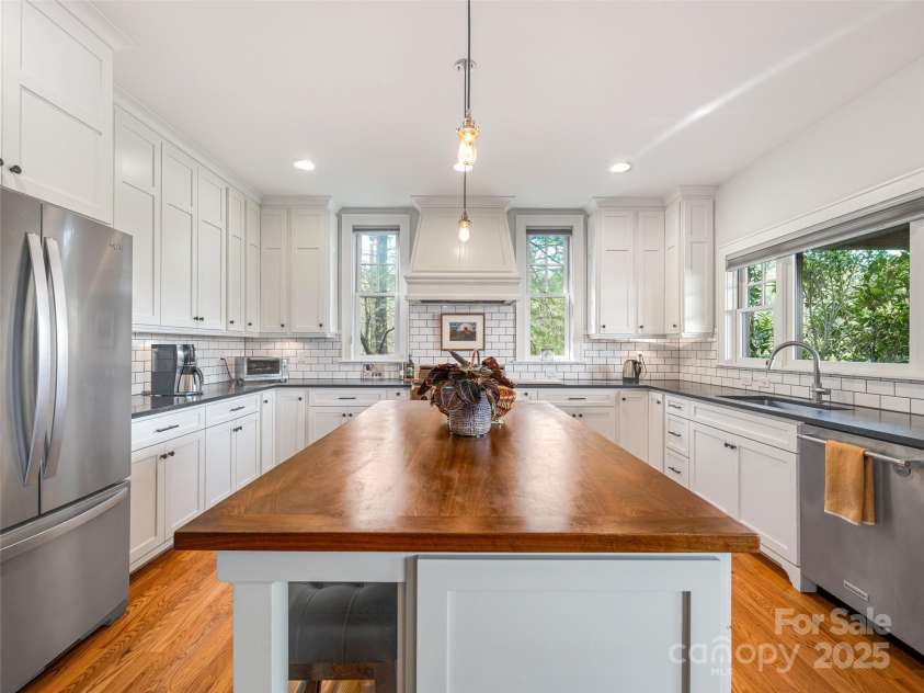 52 Beaverdam Knoll Road, Asheville, NC 28804.  MLS# CAR4242445, YatesRealty ID 4332. Extra large kitchen island with space for seating