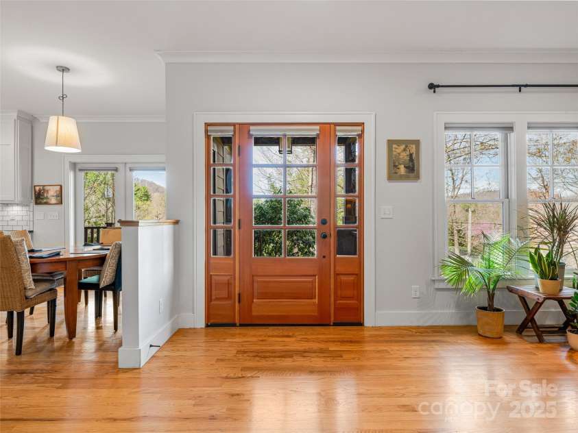52 Beaverdam Knoll Road, Asheville, NC 28804.  MLS# CAR4242445, YatesRealty ID 4332. Front entrance, dining area to the left