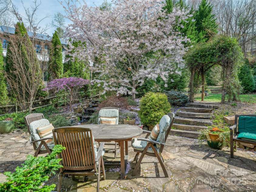 52 Beaverdam Knoll Road, Asheville, NC 28804.  MLS# CAR4242445, YatesRealty ID 4332. Mature landscaping affords the ultimate relaxation