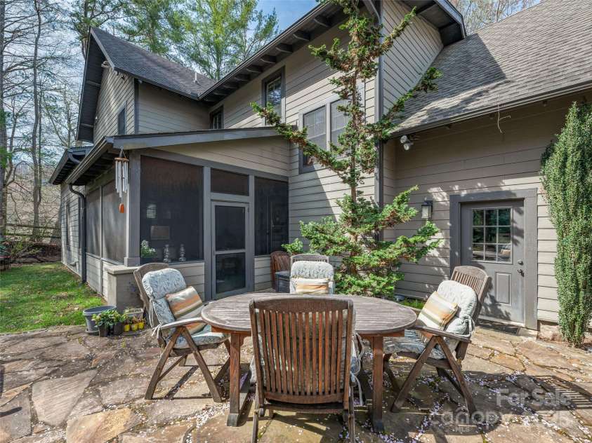 52 Beaverdam Knoll Road, Asheville, NC 28804.  MLS# CAR4242445, YatesRealty ID 4332. Screened back patio, exterior garage door entry