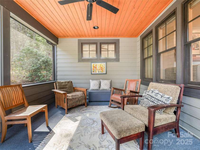 52 Beaverdam Knoll Road, Asheville, NC 28804.  MLS# CAR4242445, YatesRealty ID 4332. Screened back patio with ceiling fan