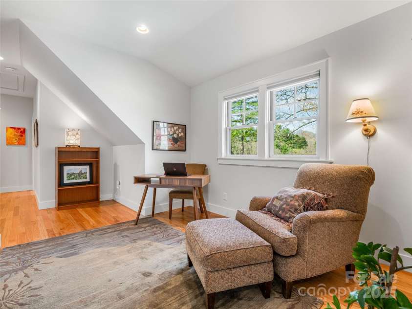 52 Beaverdam Knoll Road, Asheville, NC 28804.  MLS# CAR4242445, YatesRealty ID 4332. Upper floor landing with west-facing windows