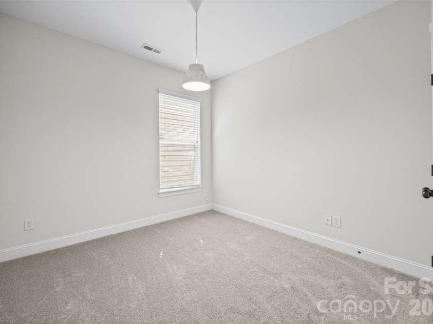 1016 Equipoise Drive, Indian Trail, NC 28079.  MLS# CAR4407945, YatesRealty ID 43320. Bedroom/Office first floor