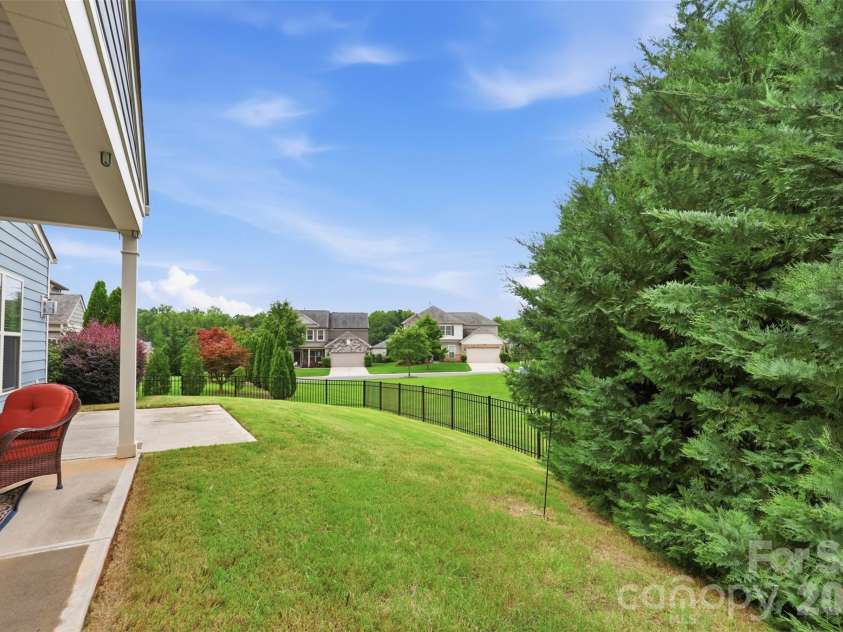 1030 Squire Drive, Indian Land, SC 29707.  MLS# CAR4408694, YatesRealty ID 43322. Backyard