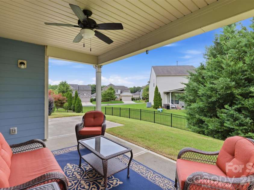 1030 Squire Drive, Indian Land, SC 29707.  MLS# CAR4408694, YatesRealty ID 43322. Covered Back Porch