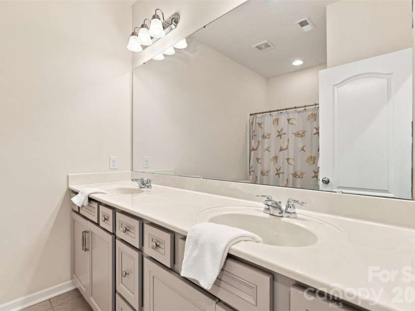1030 Squire Drive, Indian Land, SC 29707.  MLS# CAR4408694, YatesRealty ID 43322. Hall Bathroom