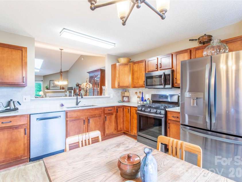 5303 Wood Duck Way, Hendersonville, NC 28792.  MLS# CAR4412210, YatesRealty ID 43331. 