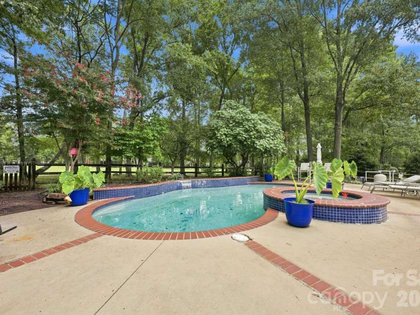 4620 Fairvista Drive, Charlotte, NC 28269.  MLS# CAR4411125, YatesRealty ID 43339. Pool/Spa