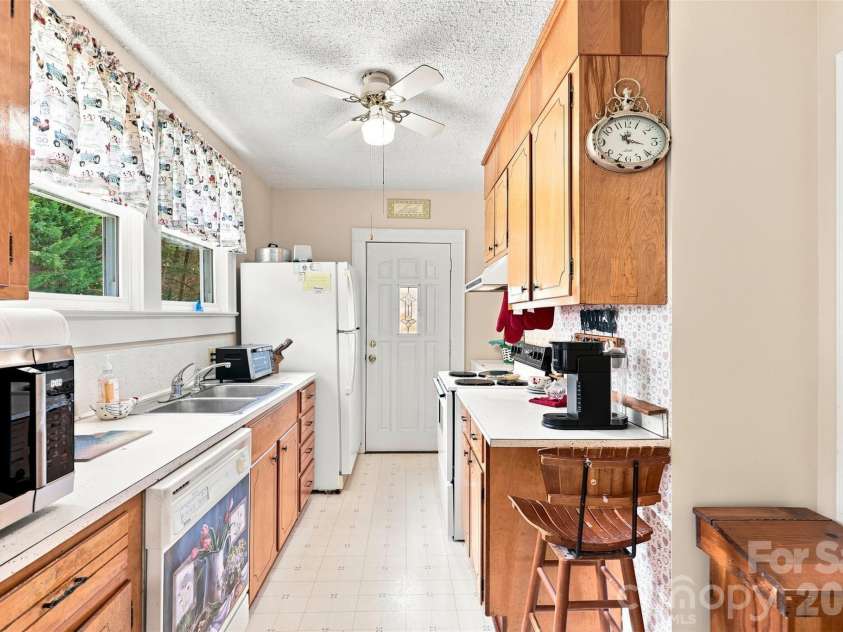 1106 Main Street, Mount Holly, NC 28120.  MLS# CAR4413131, YatesRealty ID 43348. Galley Style Kitchen