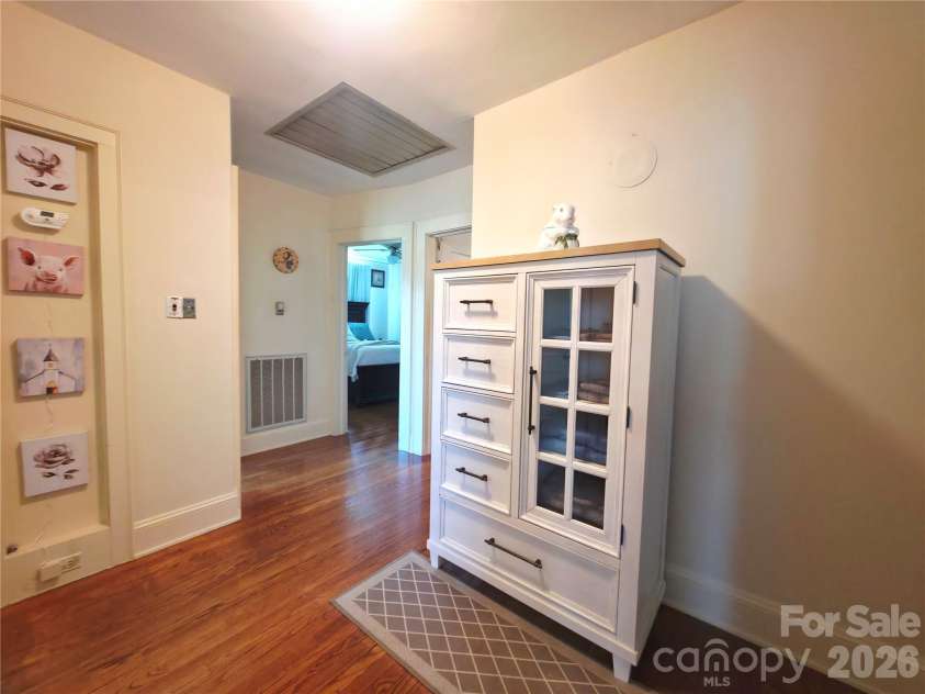 1106 Main Street, Mount Holly, NC 28120.  MLS# CAR4413131, YatesRealty ID 43348. Oversized hall with working attic fan. Runs smooth and has been maintained.