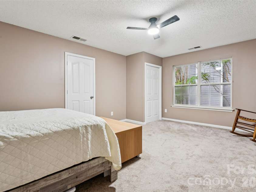 5645 Winslow Avenue, Concord, NC 28027.  MLS# CAR4400484, YatesRealty ID 43352. Large secondary bedroom with walk out attic storage space