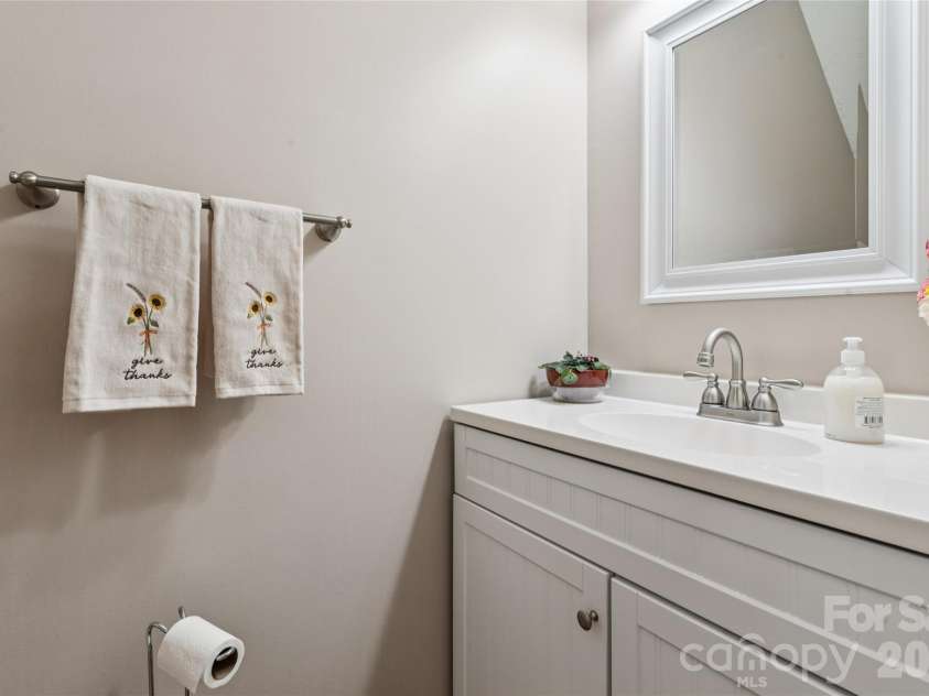 5645 Winslow Avenue, Concord, NC 28027.  MLS# CAR4400484, YatesRealty ID 43352. Main floor half bath