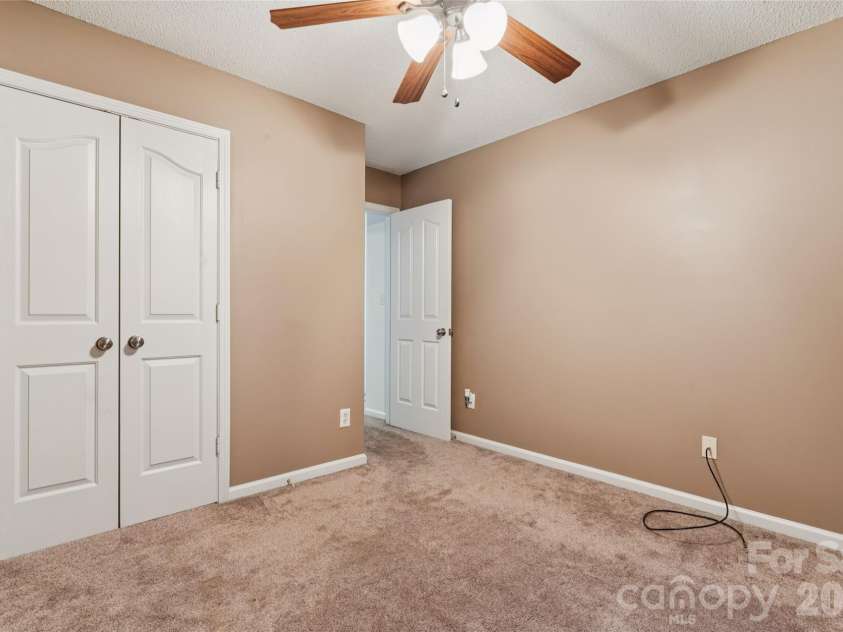 5645 Winslow Avenue, Concord, NC 28027.  MLS# CAR4400484, YatesRealty ID 43352. Secondary bedroom