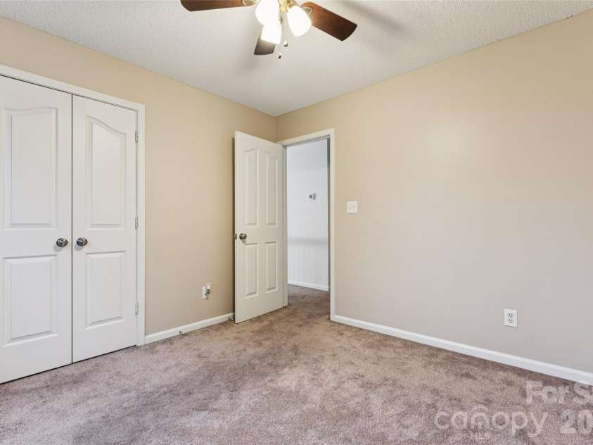 5645 Winslow Avenue, Concord, NC 28027.  MLS# CAR4400484, YatesRealty ID 43352. Secondary bedroom
