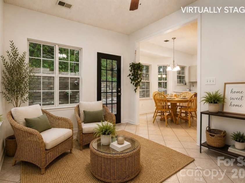 5645 Winslow Avenue, Concord, NC 28027.  MLS# CAR4400484, YatesRealty ID 43352. Virtually staged sunroom