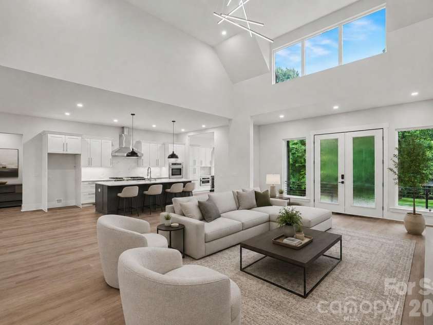 4808 Rockwood Drive, Waxhaw, NC 28173.  MLS# CAR4410611, YatesRealty ID 43354. Living room into kitchen-virtually staged