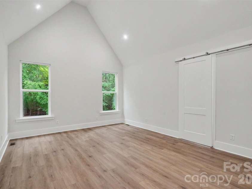 4808 Rockwood Drive, Waxhaw, NC 28173.  MLS# CAR4410611, YatesRealty ID 43354. Primary Bedroom with vaulted ceiling -