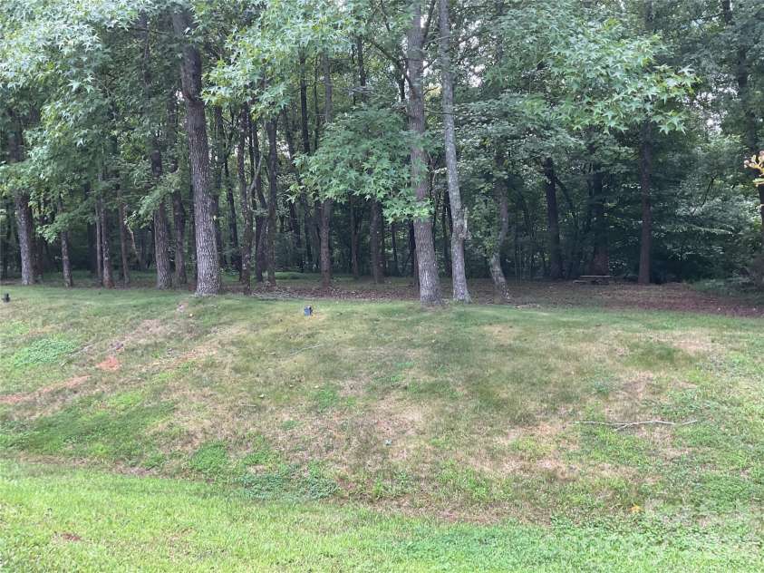 935 Wind Carved Lane, Monroe, NC 28110.  MLS# CAR4412937, YatesRealty ID 43358. Back yard