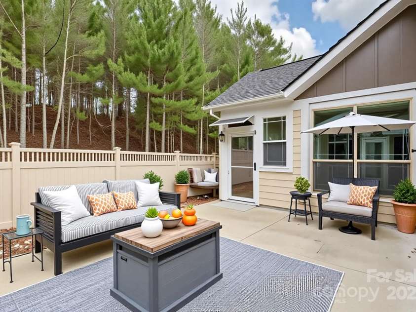 51 Honeycrisp Court, Flat Rock, NC 28731.  MLS# CAR4219665, YatesRealty ID 4336. Spacious Courtyard Patio with Virtual Staging
