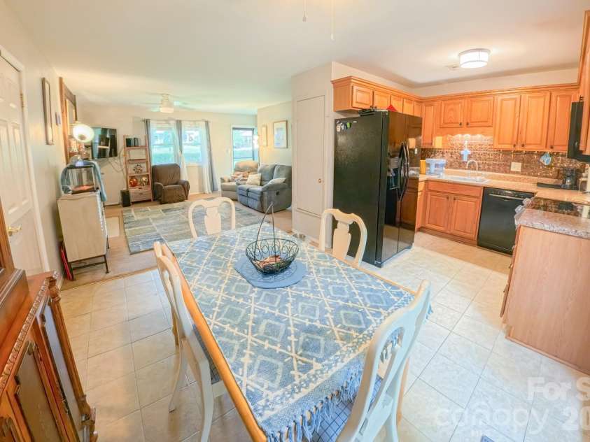 121 Wicklow Drive, Asheville, NC 28806.  MLS# CAR4407980, YatesRealty ID 43364. Dining, Kitchen and Livingroom