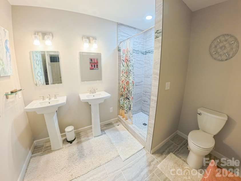 121 Wicklow Drive, Asheville, NC 28806.  MLS# CAR4407980, YatesRealty ID 43364. Primary Bathroom, spacious tiled walk in shower