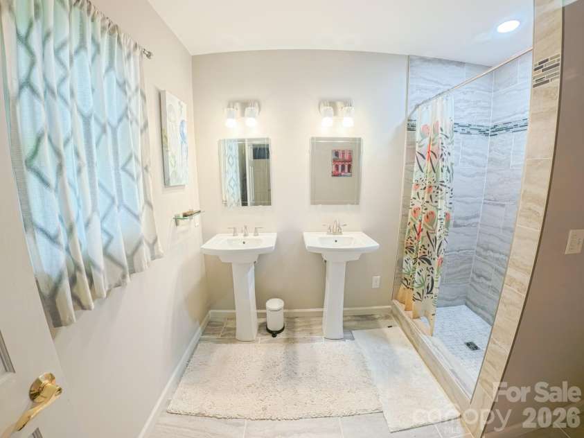121 Wicklow Drive, Asheville, NC 28806.  MLS# CAR4407980, YatesRealty ID 43364. Primary Bathroom, tiled walk in shower