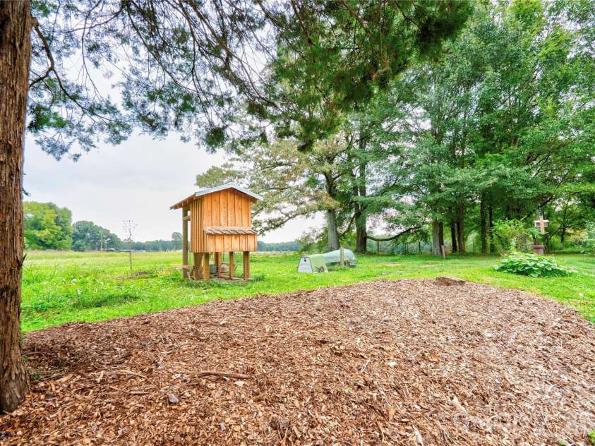 411 Pleasant Ridge Church Road, Shelby, NC 28152.  MLS# CAR4413166, YatesRealty ID 43372. Side Yard