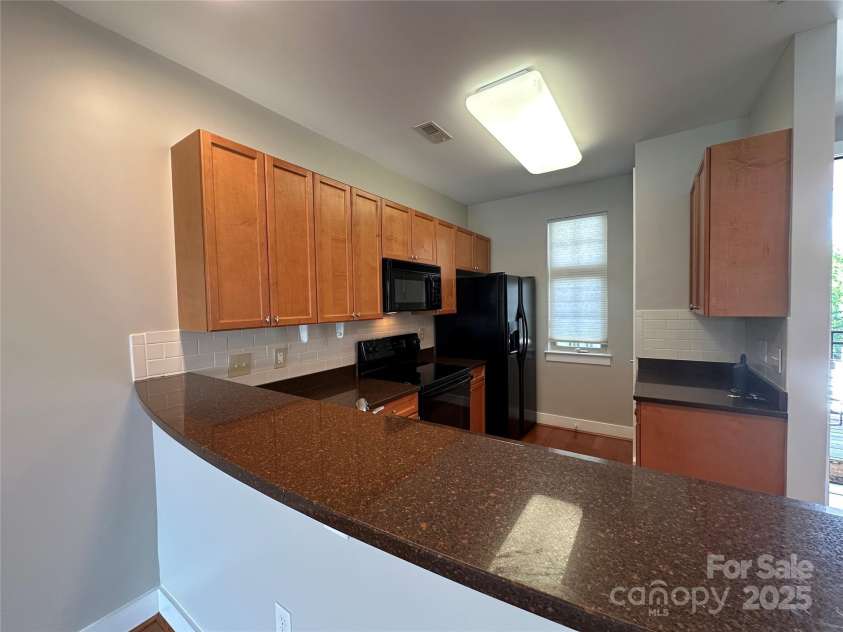 1101 1st Street, Charlotte, NC 28202.  MLS# CAR4282348, YatesRealty ID 4338. Kitchen