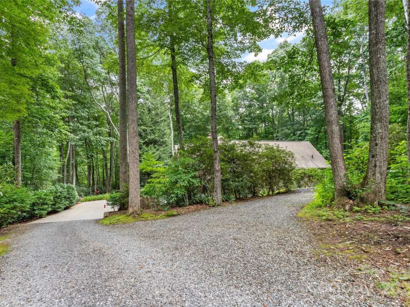 93 Hickory Drive, Maggie Valley, NC 28751.  MLS# CAR4290605, YatesRealty ID 4338. Additional parking area on drive to home appropriate for RV