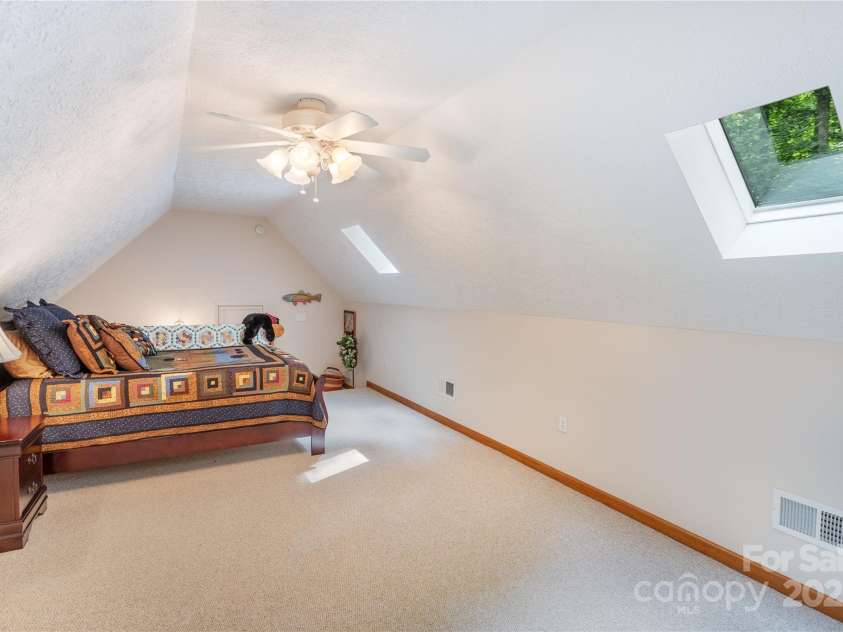 93 Hickory Drive, Maggie Valley, NC 28751.  MLS# CAR4290605, YatesRealty ID 4338. Amazing and versatile finished room over garage