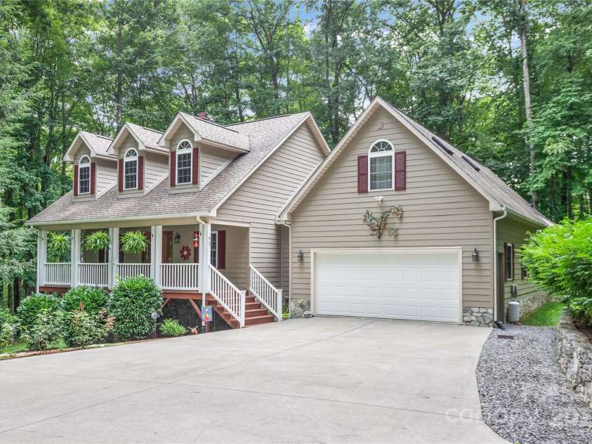 93 Hickory Drive, Maggie Valley, NC 28751.  MLS# CAR4290605, YatesRealty ID 4338. Ample parking on large concrete drive
