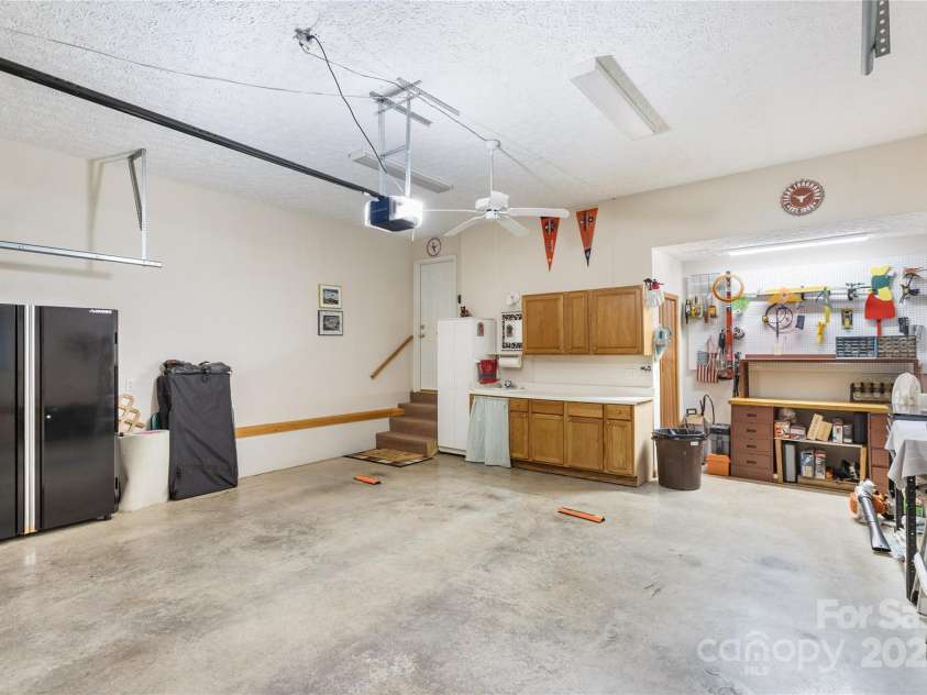 93 Hickory Drive, Maggie Valley, NC 28751.  MLS# CAR4290605, YatesRealty ID 4338. Dedicated work space in garage