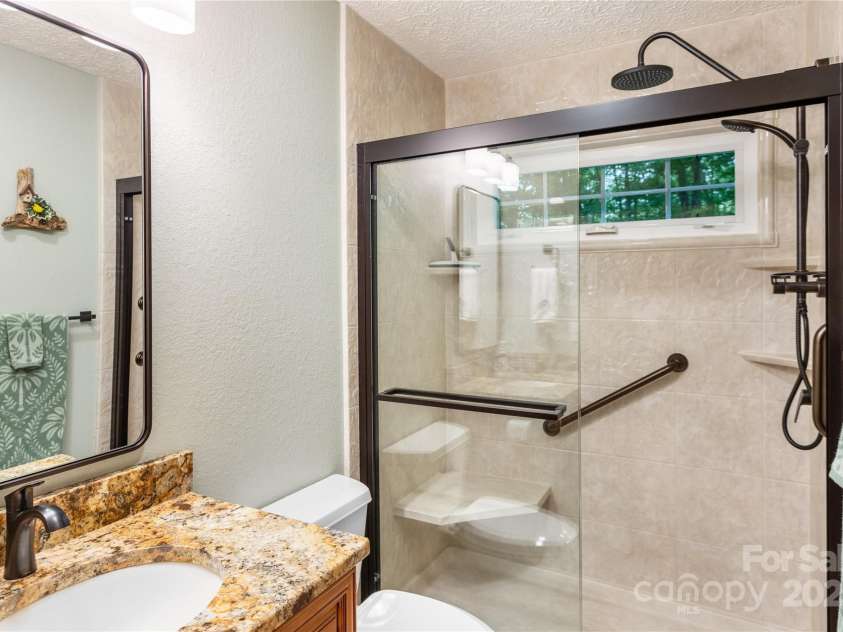 93 Hickory Drive, Maggie Valley, NC 28751.  MLS# CAR4290605, YatesRealty ID 4338. Fully and beautifully remodeled bath 2