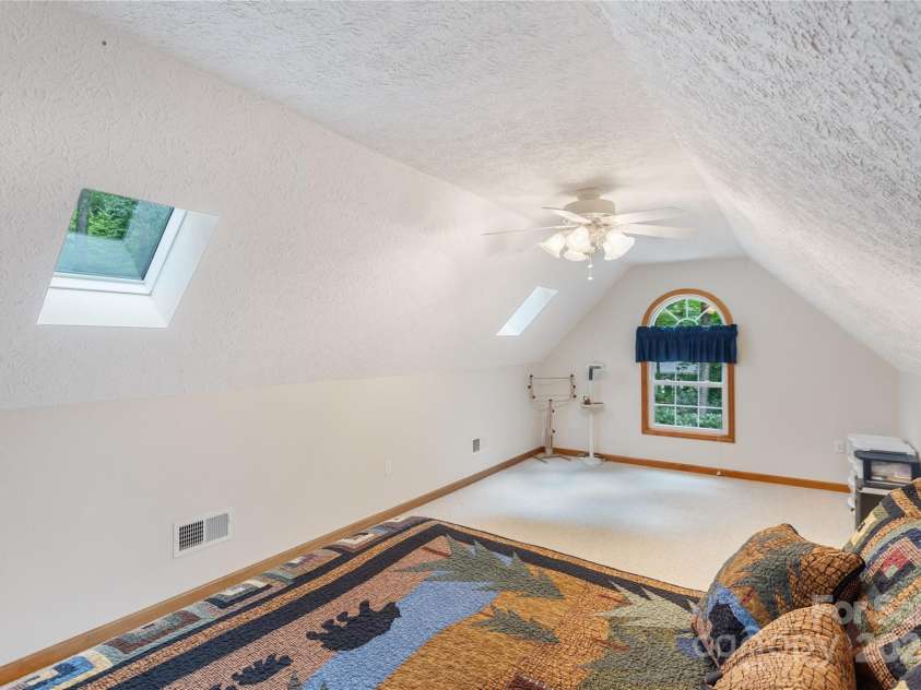 93 Hickory Drive, Maggie Valley, NC 28751.  MLS# CAR4290605, YatesRealty ID 4338. Ideal for craft, play or additional sleeping space