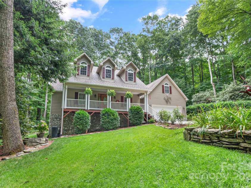 93 Hickory Drive, Maggie Valley, NC 28751.  MLS# CAR4290605, YatesRealty ID 4338. LUSH lawn and gorgeous landscaping