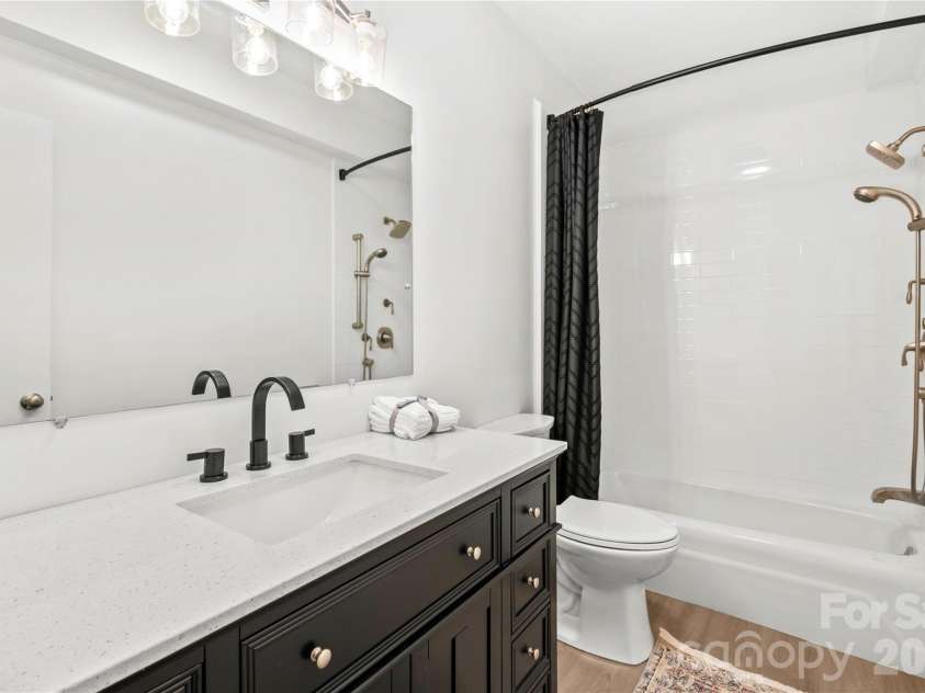 63 Shepard Square, Brevard, NC 28712.  MLS# CAR4411388, YatesRealty ID 43382. Lower Level Bathroom