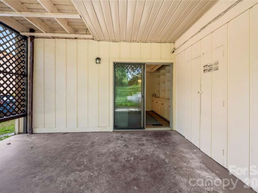 63 Shepard Square, Brevard, NC 28712.  MLS# CAR4411388, YatesRealty ID 43382. Lower Level Patio