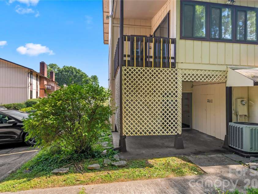 63 Shepard Square, Brevard, NC 28712.  MLS# CAR4411388, YatesRealty ID 43382. Lower Level Patio