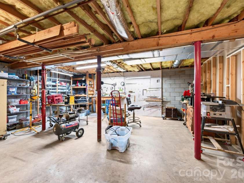 23 Oaks Circle, Asheville, NC 28806.  MLS# CAR4410251, YatesRealty ID 43398. Heated and Cooled Workshop