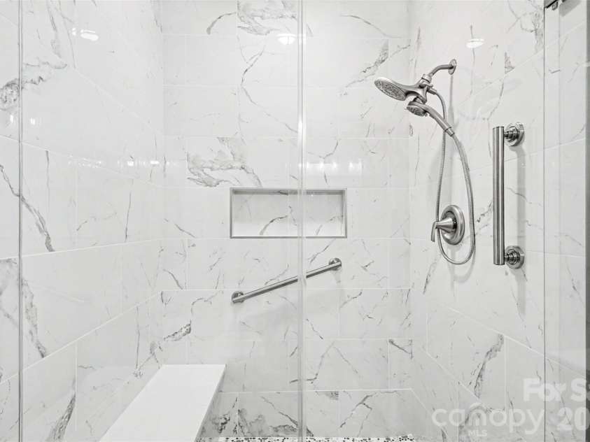 10753 Tradition View Drive, Charlotte, NC 28269.  MLS# CAR4406474, YatesRealty ID 43399. Featuring this sparkling walk-in shower.