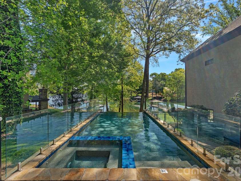 4786 Heather Lane, Denver, NC 28037.  MLS# CAR4224654, YatesRealty ID 4340. Enjoy The Outdoors Almost-Year-Round, With a Heated Pool & Spa! 